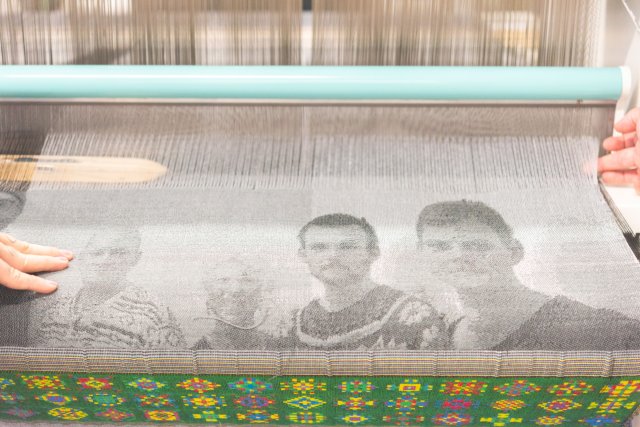 Student working with digital jacquard at the textile workshop.