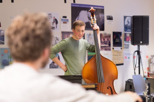 Two people working on a music project